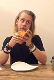 Macaulay Culkin Eating a Slice of Pizza (2013) cover